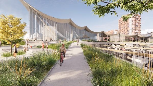 Västerås nya resecentrum, med en ombyggd bangård och en ny gång- och cykelväg över spår. I bakgrunden syns Corems nya bostäder och kontor i kvarter Sigurd 3. Illustration: BIG.