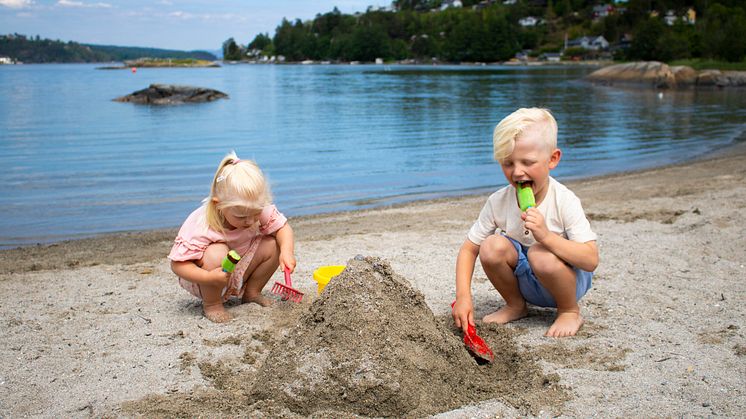 Kræsj Green - ispising på strand