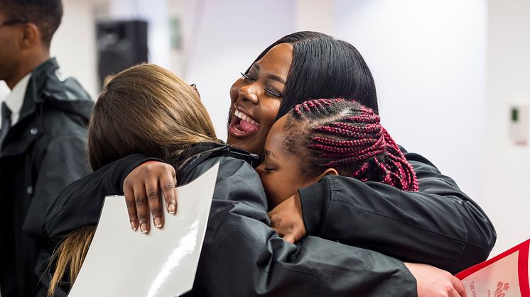 Cynthia Bosombi-Mandete and fellow Prince's Trust 'Get Into Railways' programme graduates  celebrate their job offers from GTR