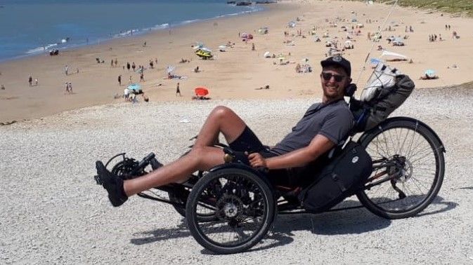 Jimmy Hubbard on his ICE trike, a recumbent cycle suited to his disabilities.