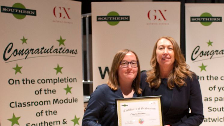 Brighton trainee driver Claire Jackson of Bexhill-on-Sea receives a certificate for completing her classroom training from Southern and Gatwick Express MD Angie Doll