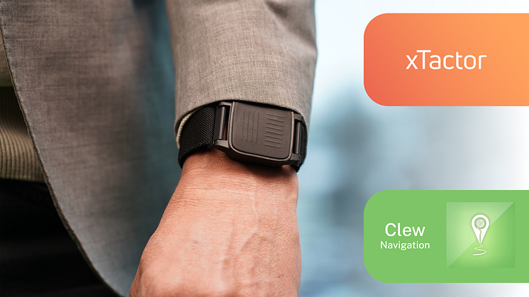 xTactor_xBand_On_Arm_With_xTactor_and_Clew_Navigation_logos