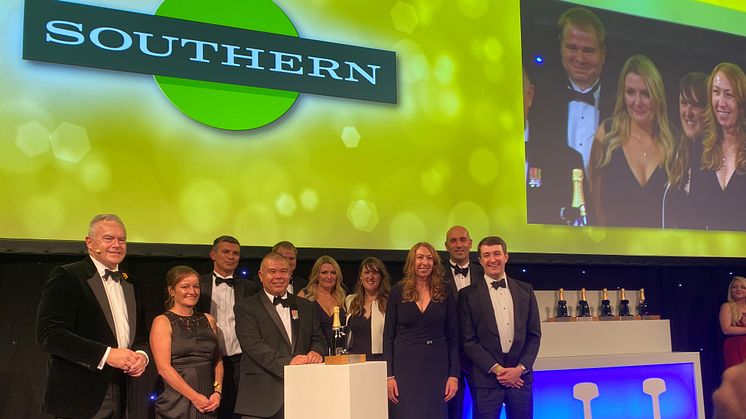 Southern Managing Director Angie Doll (third from right) and her team accept the award 'Passenger Operator of the Year' from Professor Jonathan Van-Tam, Deputy Chief Medical Officer (centre), at the National Rail Awards