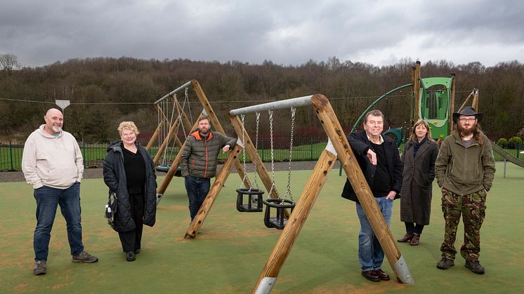 At the new Summerseat play area are (from left) Mike Bent (parks manager), Emma Speed (chair, Summerseat Village Collective), Martin Proffitt and Rachael Gilbert (Proffitts), Lee Fairhurst (deputy chair, Summerseat Village Collective).