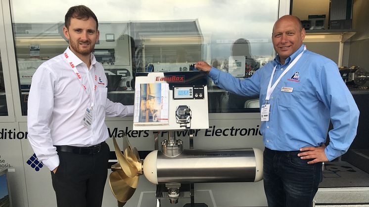 Hi-res image - Fischer Panda UK - Chris Fower, Sales and Marketing Director, Fischer Panda UK, and Martin Mews, Diesel-Electric Propulsion Systems Specialist at Fischer Panda GmbH, with the new 100 kW electric motor at Seawork International