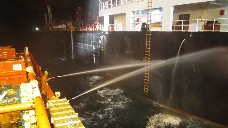 'Esvagt Omega' in firefighting operation at the tanker Alia, 20 October 2015