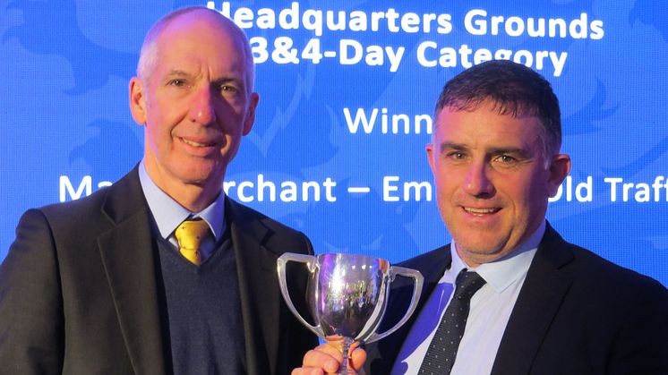 Emirates Old Trafford head groundsman Matt Merchant (right) accepts his award from ECB Head of Cricket Operations (First-Class) Alan Fordham