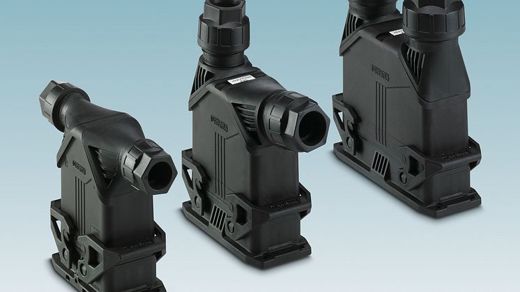 Connector housing with lateral and straight cable outlet direction