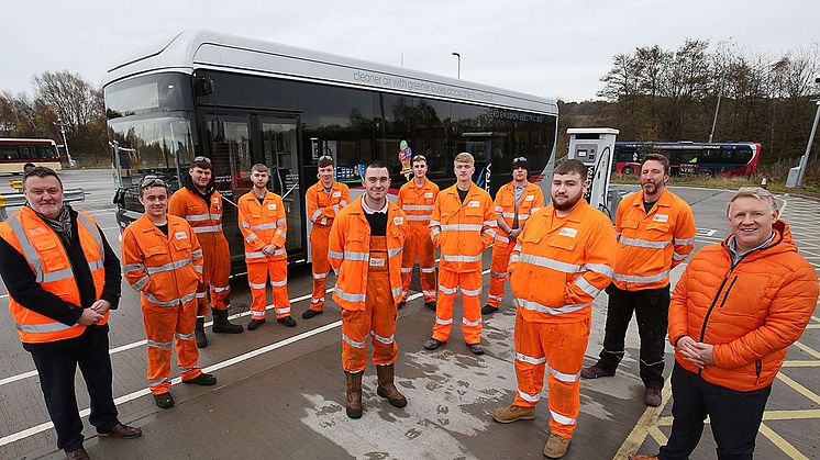 (L-R) Kevin Marston, Assistant Principal at Gateshead College, with some of the apprentices, and Colin Barnes, engineering director at Go North East