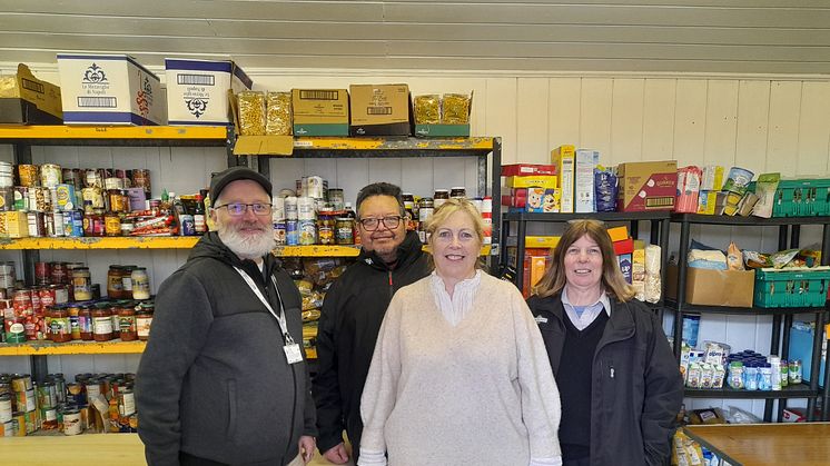 Foodbank finds floorspace: Southern's Rob Whitehead (left) and June Henty (right) with Sarah Jones and Marcus Jones of Whyteleafe Community HUB