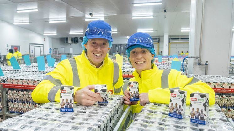 Müller Milk & Ingredients CEO Patrick Müller and Scottish 400 metres hurdles record holder and multiple medallist, Eilidh Doyle at Bellshill Dairy 