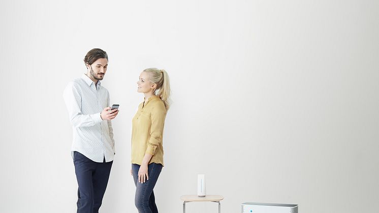 Smart tech for humans: The chic Blueair Sense+ air purifier (far right) partners with the slim, conical shaped Blueair Aware air monitor (on table) to put people in control of the air they breathe without even needing to think about it.