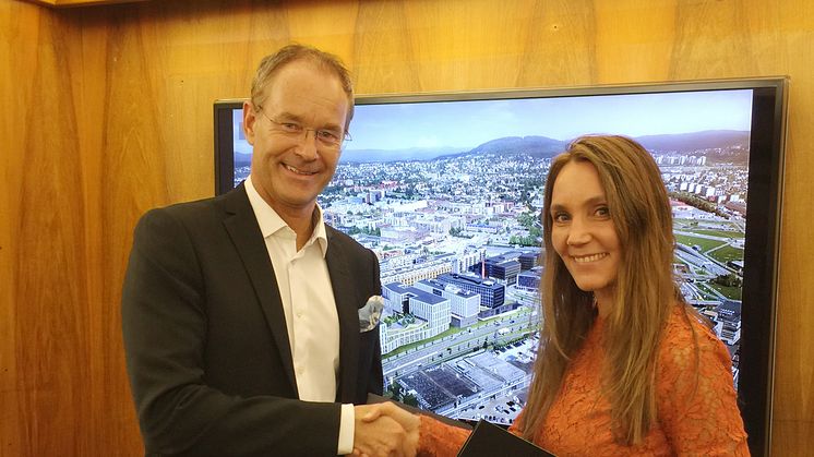 Eirik Thrygg, adm. dir. i Höegh Eiendom, og Mariann Vollan, daglig leder i Evolve.