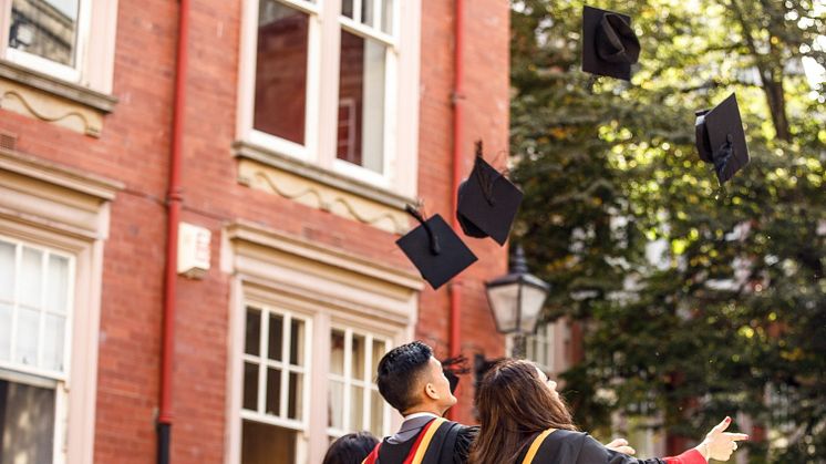 Students celebrate during Northumbria University's graduation ceremonies