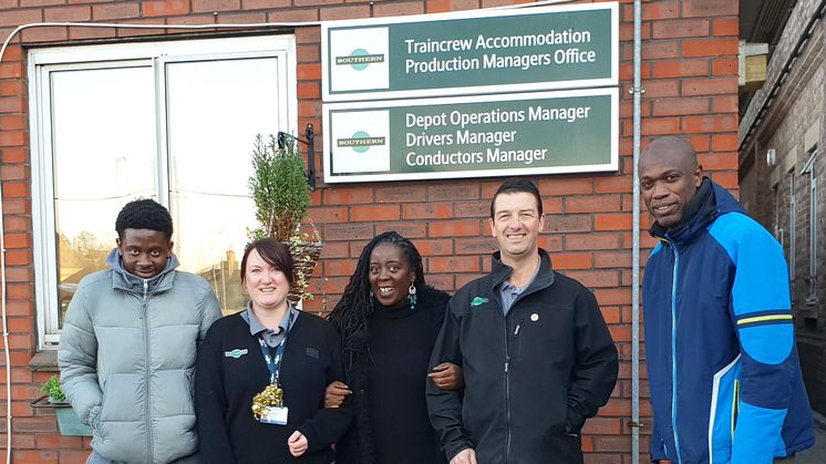 Croydon Community Food Bank volunteers Amatare Oki (far right) and Hakeem Seriki (far left) visited the Selhurst depot with Project Manager Fatima Koroma (middle)
