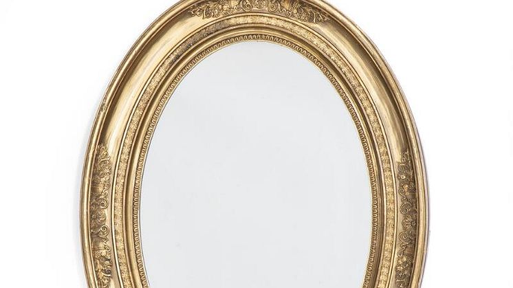 Ovalt dansk senempire spejl i ramme af forgyldt træ og gesso. 1840'erne