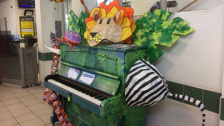 Horsham station's Rumble In The Jungle piano, decorated by children from Queen Elizabeth II school