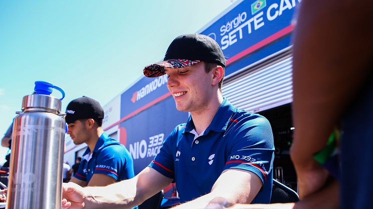 NIO333 race team drivers stay hydrated while signing autographs at the Cape Town BB FIA Formula E World Championship 