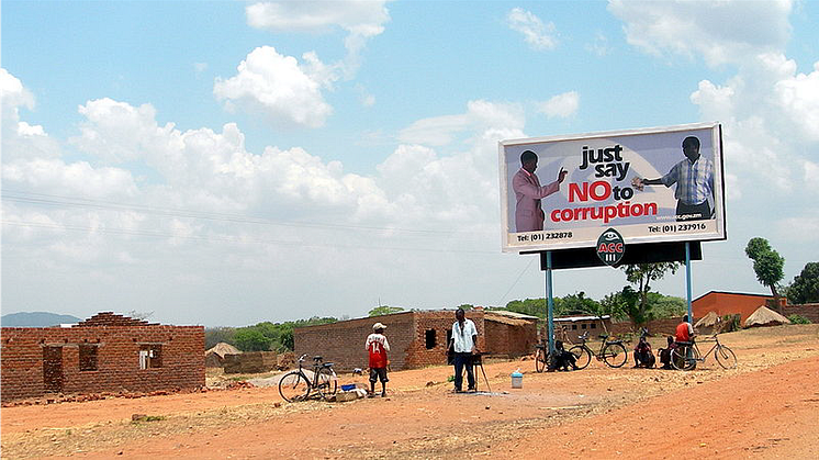 Anti-corruption billboards are displayed in cities and along roads. Their impact on people’s behaviour does not seem successful however. Photo: Lars Plougmann (CC BY-SA 2.0)