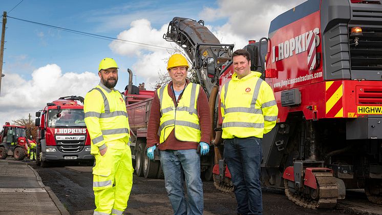 Councillor Alan Quinn with highway maintenance contractor J Hopkins.