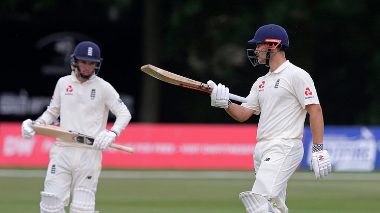 Sam Hain celebrates his 50 against the Australian XI at Canterbury