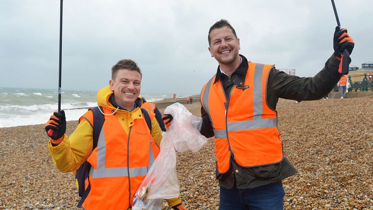 Soaked but still smiling - Project Consultation Manager Ben Thomas and Events Manager David Mitchell at the Brighton & Hove GTR beach clean 2023