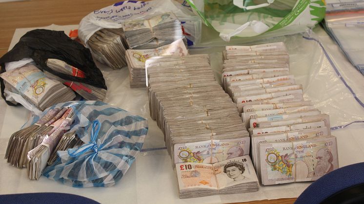 £15m fraud gang jailed - £98,990 of the seized cash
