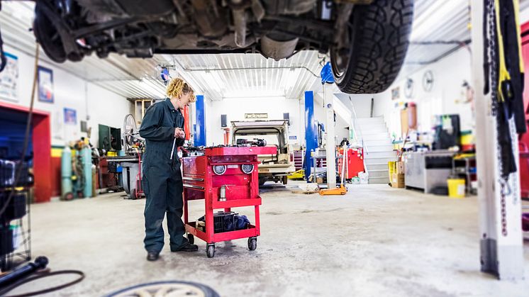 Female mechanic in garage