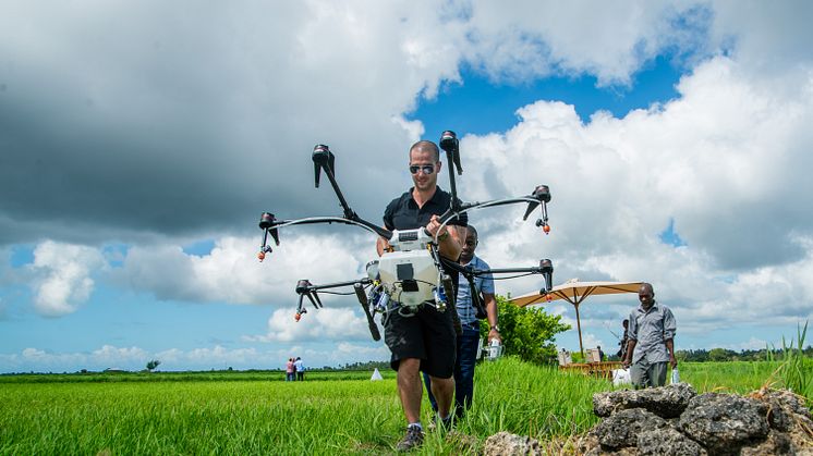 DJI Agras MG1-S arriving on the rice fields in Africa