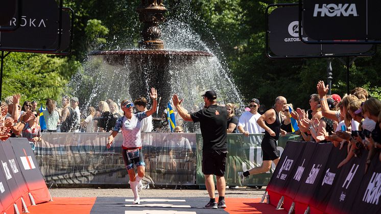 Athlete running down the red carpet_Photo by Michael Campanella - Getty Images for IRONMAN.jpg