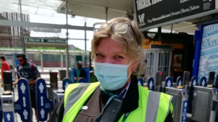 Social distancing at East Croydon station - staff member