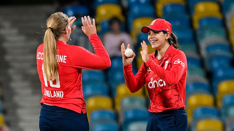 Sophie Ecclestone and Maia Bouchier celebrating at the Kensington Oval, Barbados. 