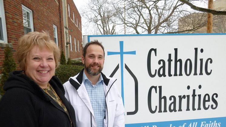 Bluewater chief engineer Kim Borjesson (right) installed Bluewater's Pro water purifiers at two Flint community care centers one year ago, in January 2016