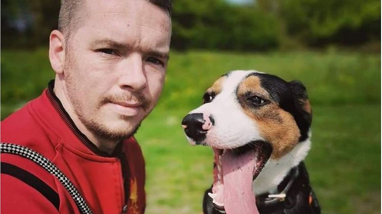 Mark Docksey with the family’s dog, Bohdi