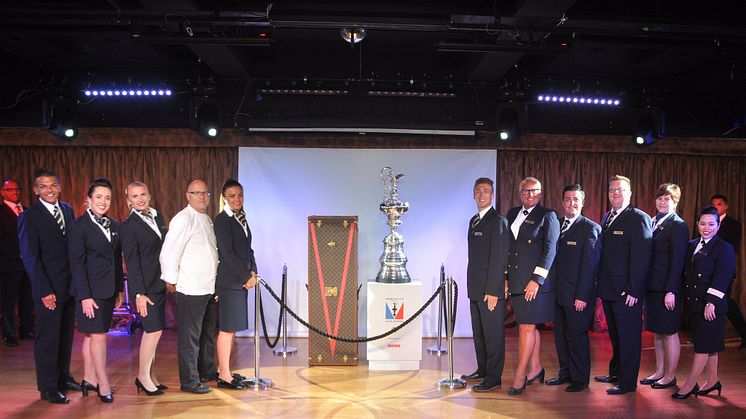Lyndsey Milne, Hotel Manager of Fred. Olsen Cruise Lines’ 'Boudicca' (fifth from right), and the ship’s crew were proud to welcome the world-famous America’s Cup on board during the 35th America’s Cup, held in Hamilton, Bermuda.