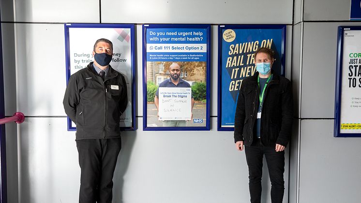 Joe Healy (left) and Ben Salmons with one of the NHS posters
