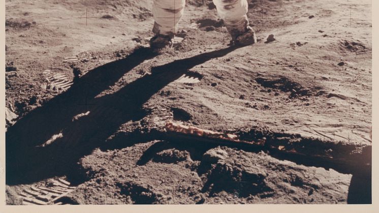 Buzz Aldrin’s gold-plated sun visor reflects the photographer and the LM Eagle.jpg