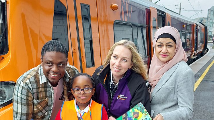 Author Jason Bryan, driver Michelle Nicholson, head teacher Sharifan Nasa and a school child