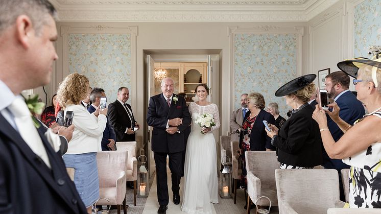 ​Rochdale stroke survivor walks daughter down the aisle after being left paralysed