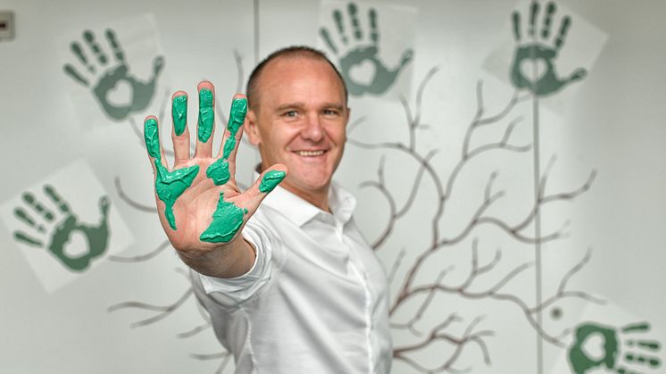 Mondelēz International Employees Get Their Hands Green for the Planet