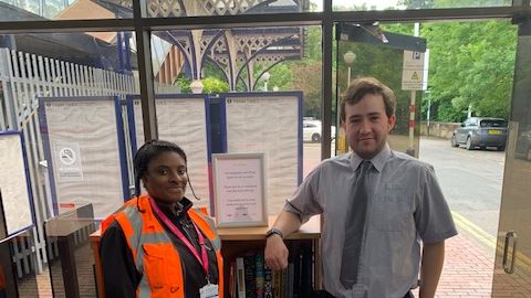 Thameslink staff Phyllicia Salmon and Stuart Miller at Radlett railway station with the new bookcase