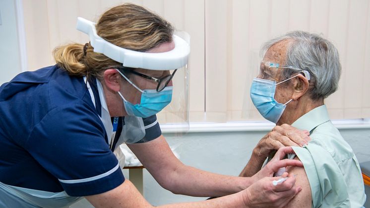 Leslie Berkeley receives his Covid vaccination from Practice Nurse Amanda Williams.