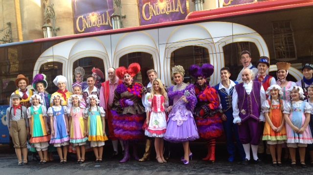The cast from Cinderella in front of Go North East's magical panto bus