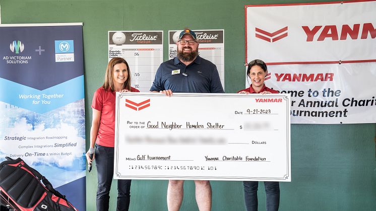 Yanmar America presents a check to Doug Belisle from the Good Neighbor Homeless Shelter at the conclusion of its 2nd Annual Charity Golf Tournament at Fields Ferry Golf Club in Calhoun, Georgia.