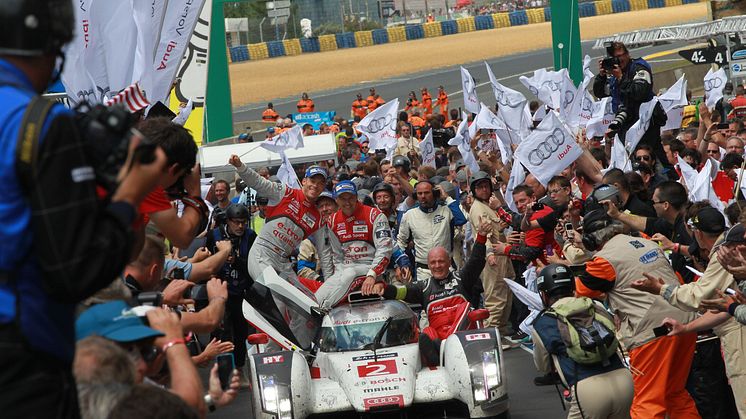 The Audi R18 e-tron quattro #2 wins the 2014 Le Mans 24h with Marcel Fässler, André Lotterer, Benoît Tréluyer