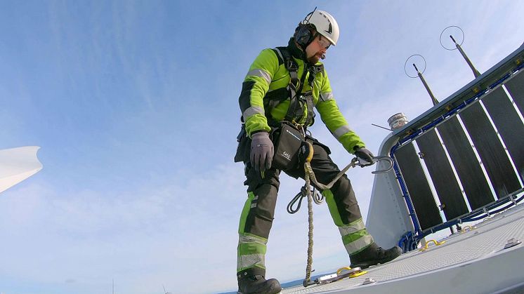 Operative undertaking maintenance on wind turbine