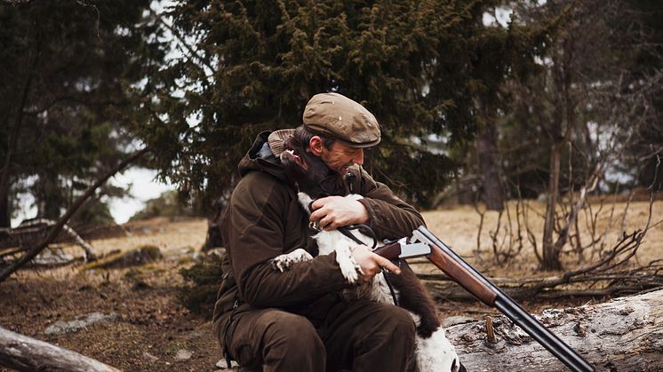 Jägare och hund