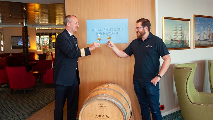 Adnams' Bradley Adnams with Fred. Olsen Cruise Lines Hotel Manager Iain Gibson