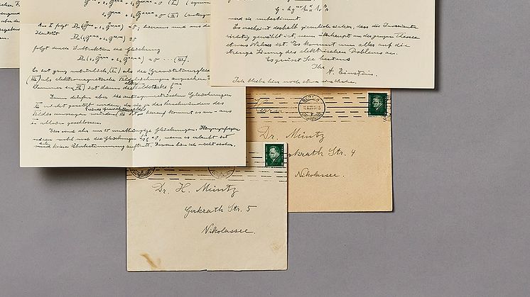 Four autograph letters, two in their original envelopes, are neatly written in ink and signed by A. Einstein.