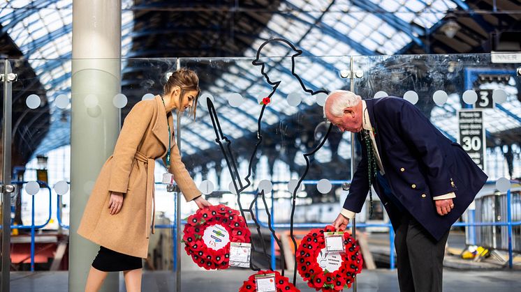 A wreath is laid at Brighton station